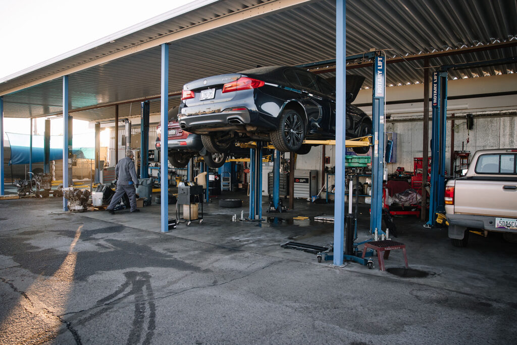 car on lift being repaired